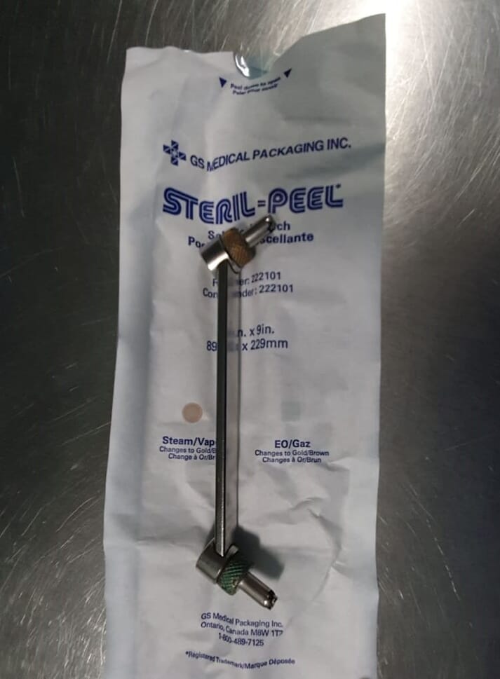 FIGURE (2) A DCP drill guide is used for achieving compression when placing dynamic compression bone plates and screws
